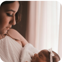 Mother holding her newborn
